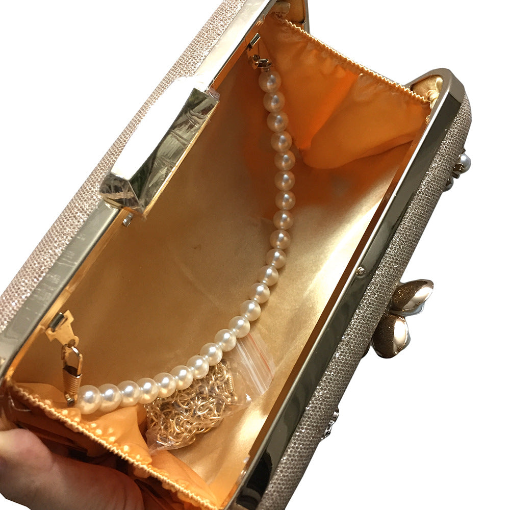 MRY · Diamond-encrusted pearl petal chain fringe dinner bag