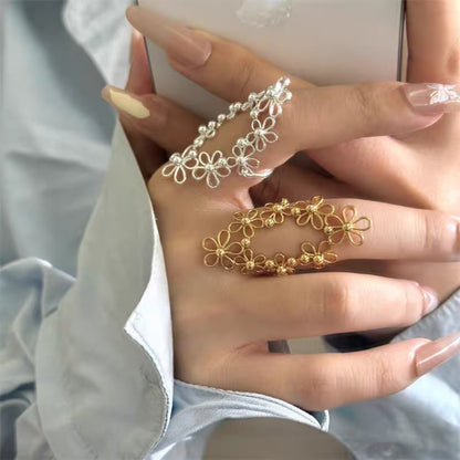Korean-style Hollow-out Floral Lace Ring with Movable Shell Pendant