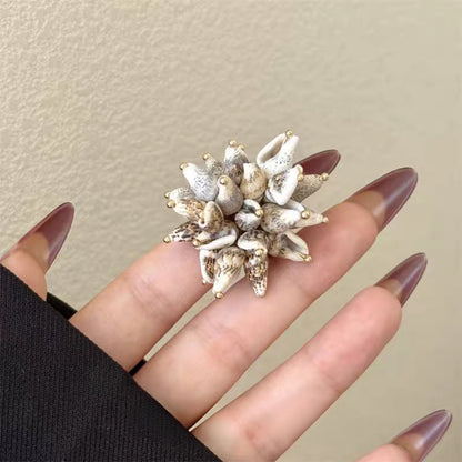 Korean-style Hollow-out Floral Lace Ring with Movable Shell Pendant