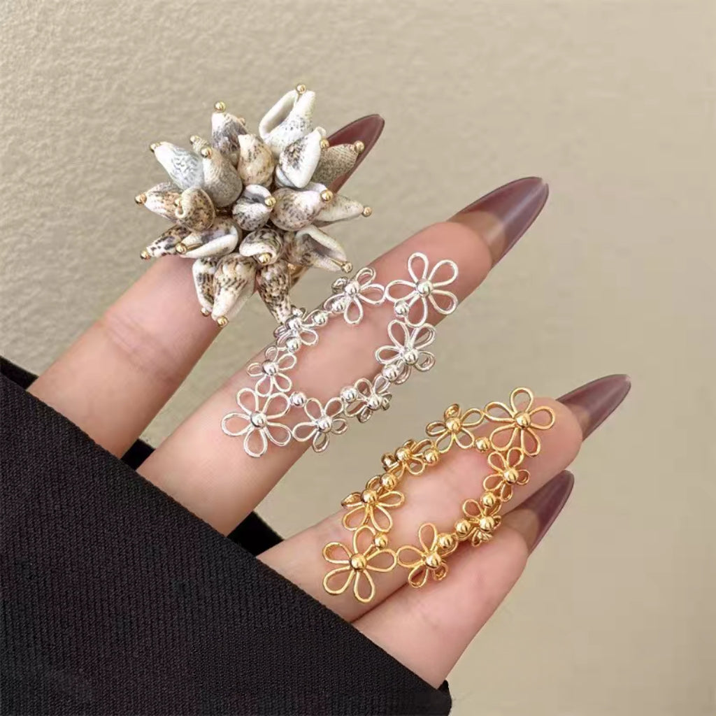 Korean-style Hollow-out Floral Lace Ring with Movable Shell Pendant
