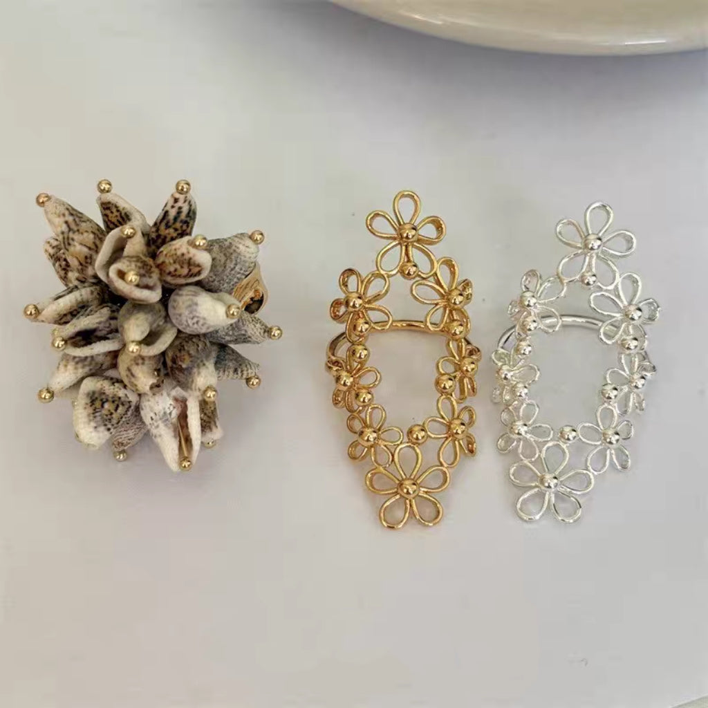 Korean-style Hollow-out Floral Lace Ring with Movable Shell Pendant