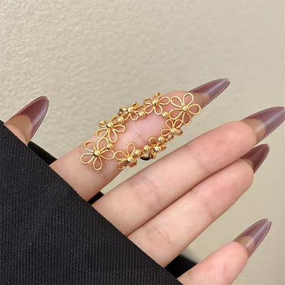 Korean-style Hollow-out Floral Lace Ring with Movable Shell Pendant