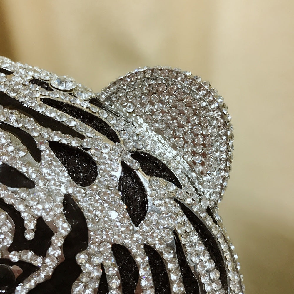MRY · Tiger head rhinestones whereas empty dinner bags