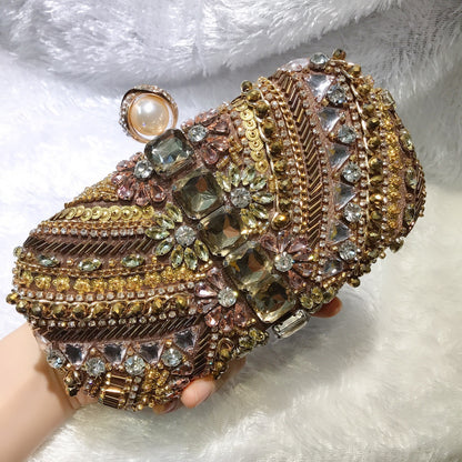 MRY · Coffee gold dinner bag in hand