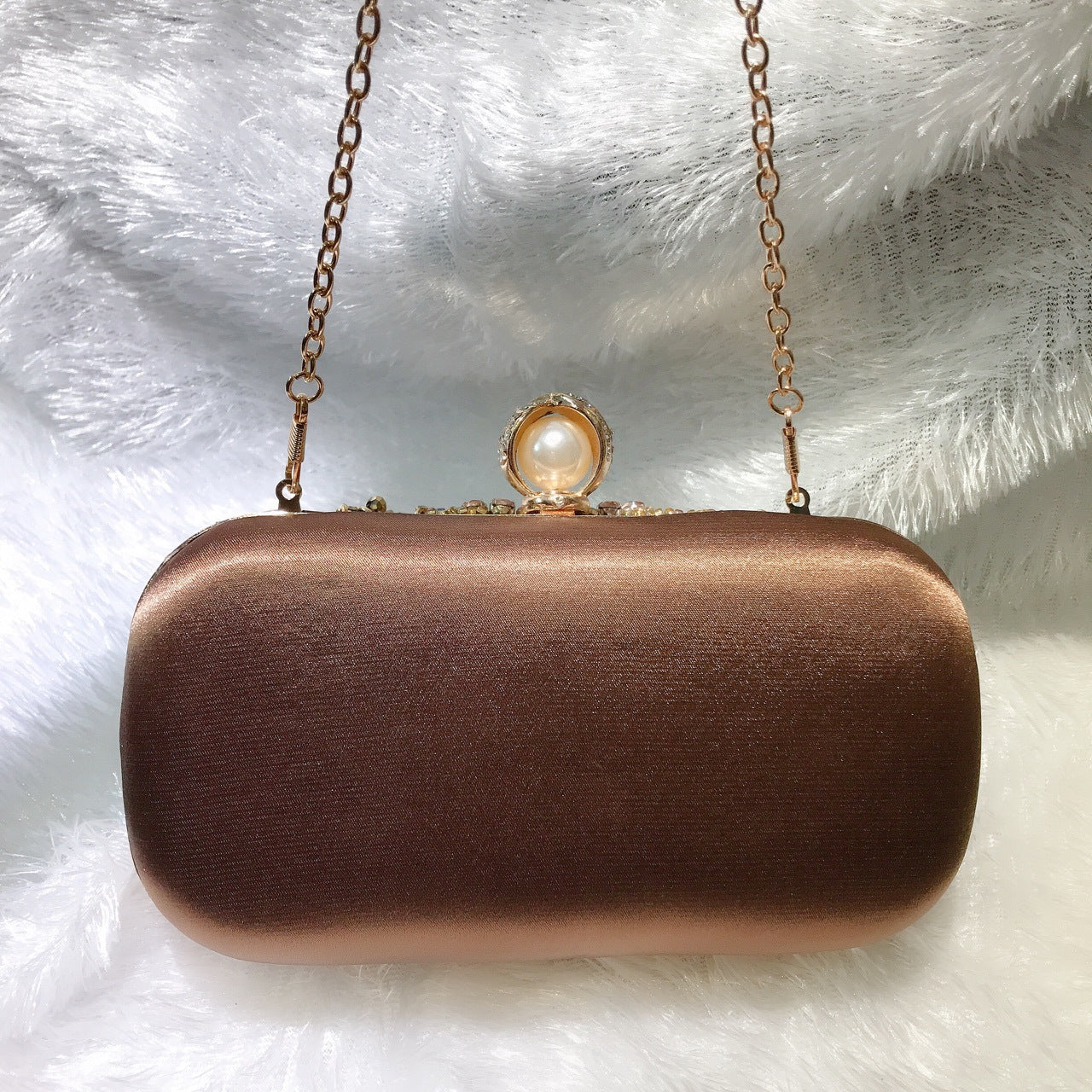 MRY · Coffee gold dinner bag in hand