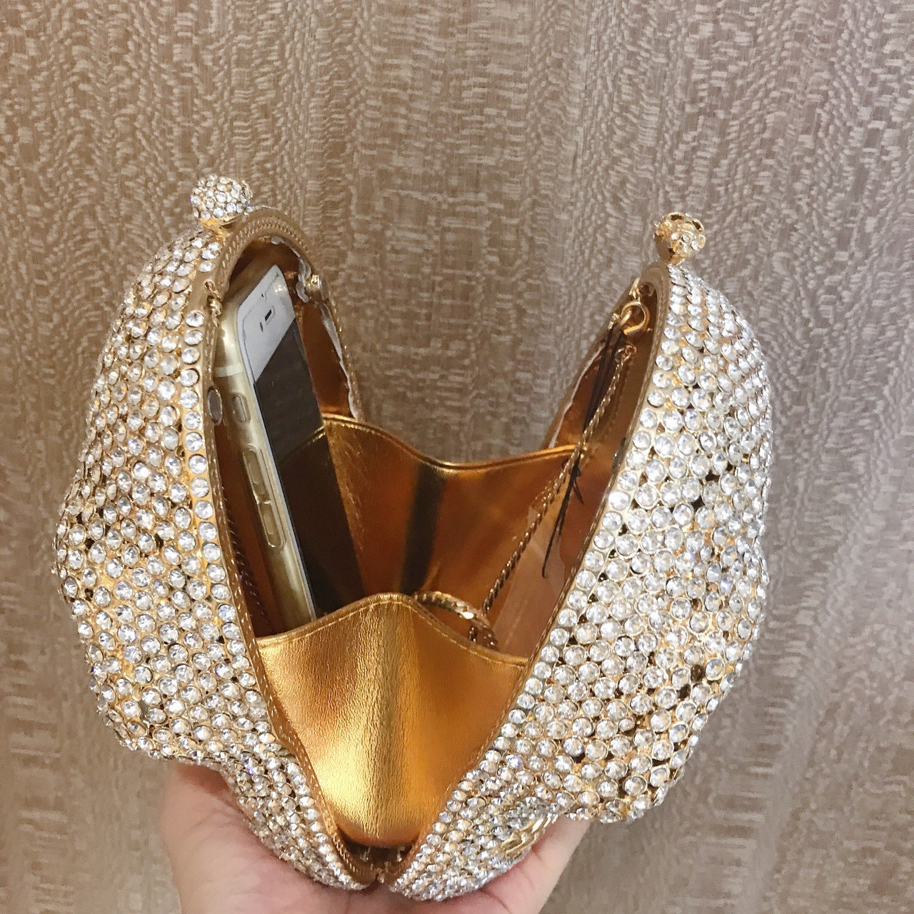 MRY · Diamond-encrusted skull dinner bag
