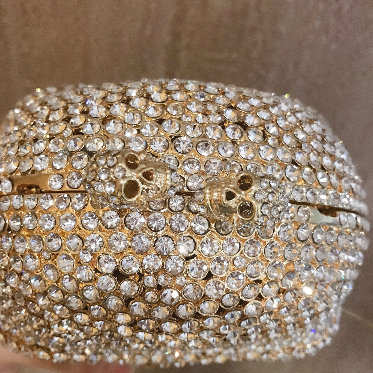 MRY · Diamond-encrusted skull dinner bag