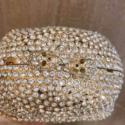 MRY · Diamond-encrusted skull dinner bag