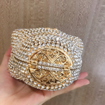 MRY · Diamond-encrusted skull dinner bag