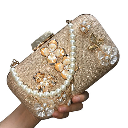 MRY · Diamond-encrusted pearl petal chain fringe dinner bag