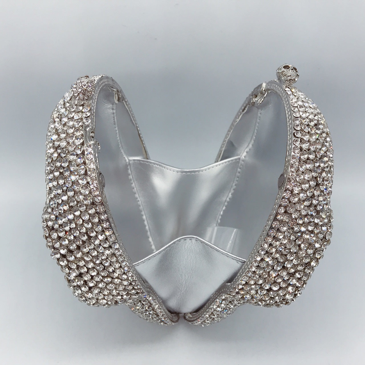 MRY · Diamond-encrusted skull dinner bag