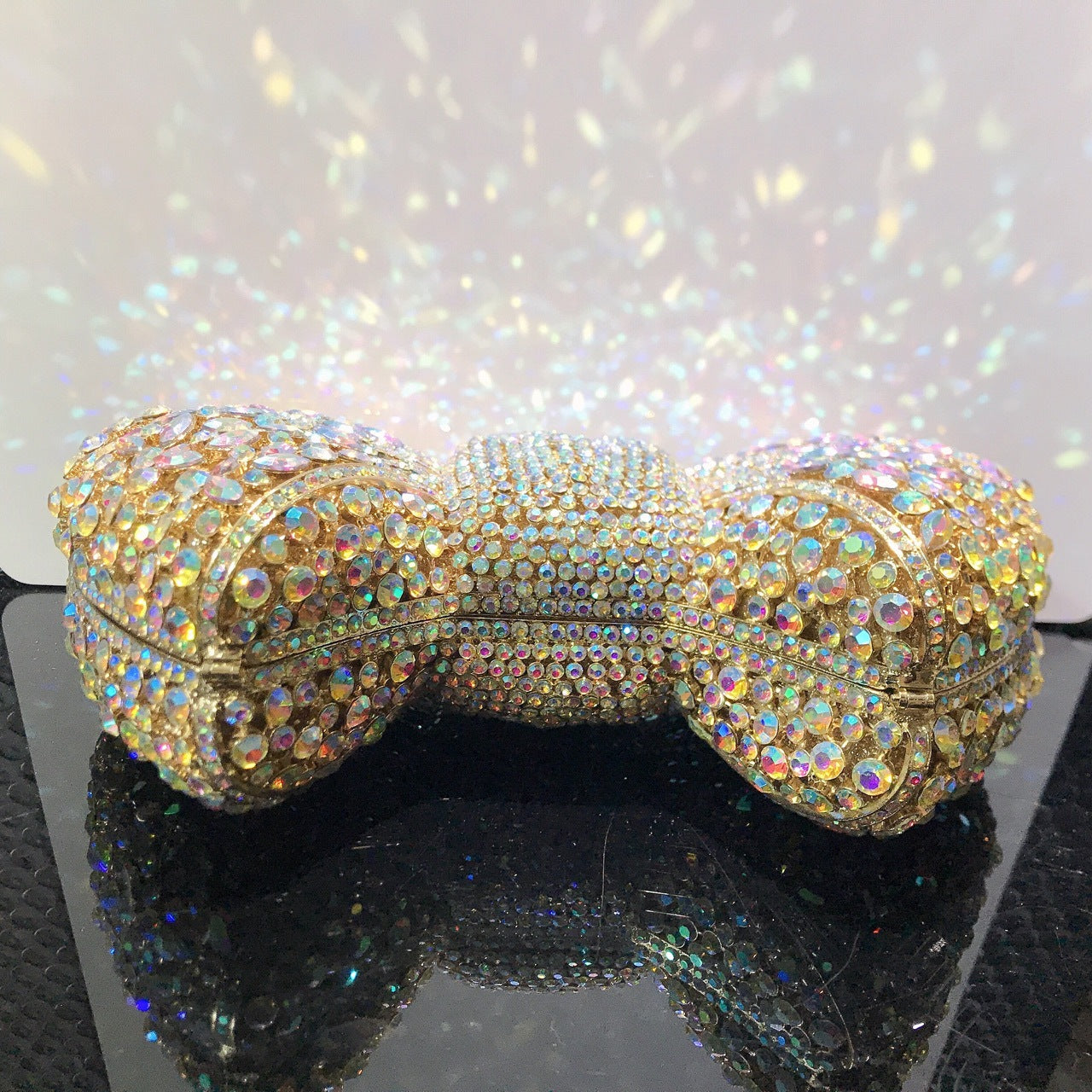 MRY · Diamond-encrusted bow dinner bag