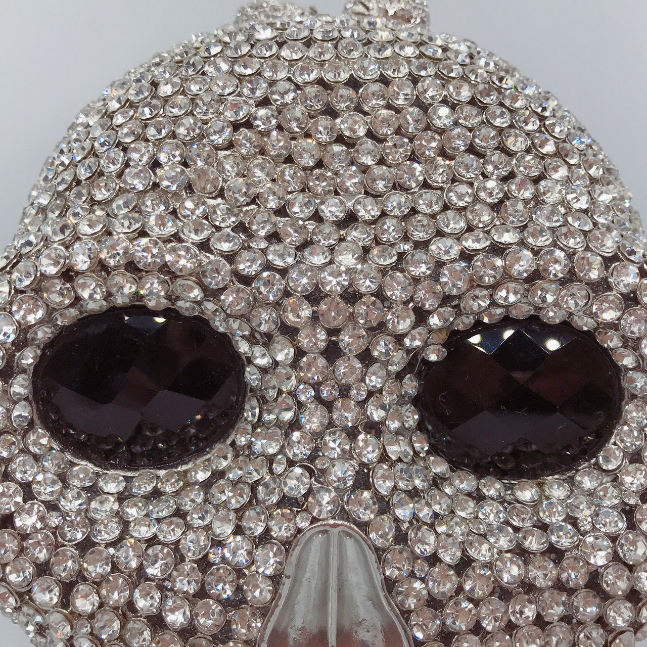 MRY · Diamond-encrusted skull dinner bag