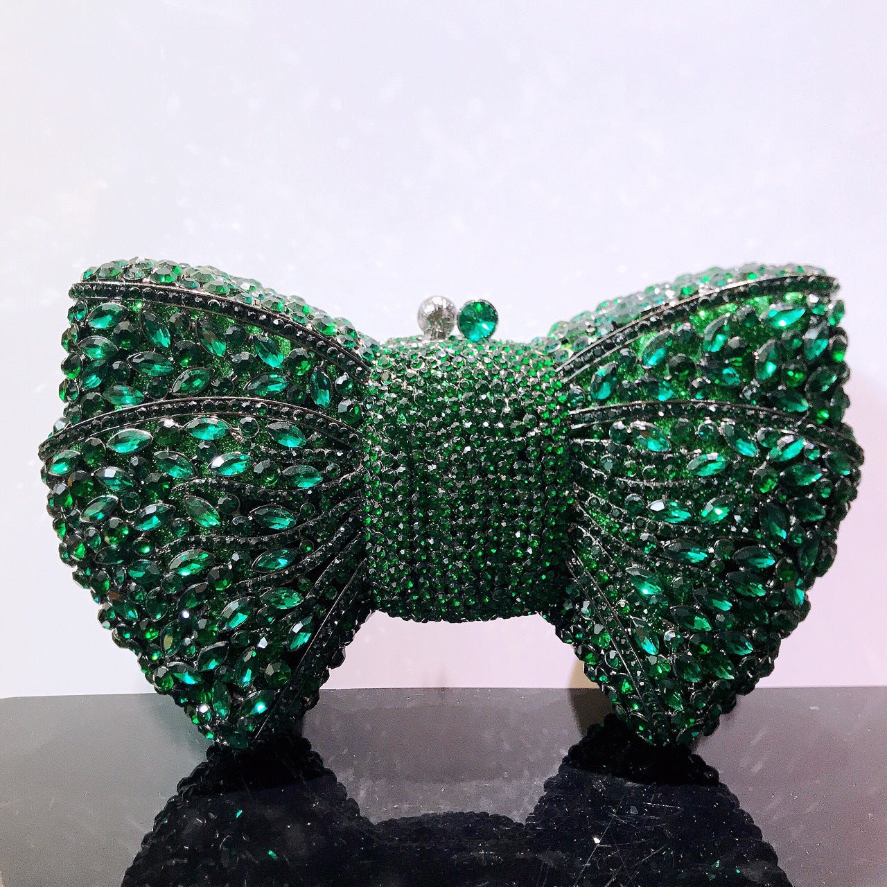 MRY · Diamond-encrusted bow dinner bag