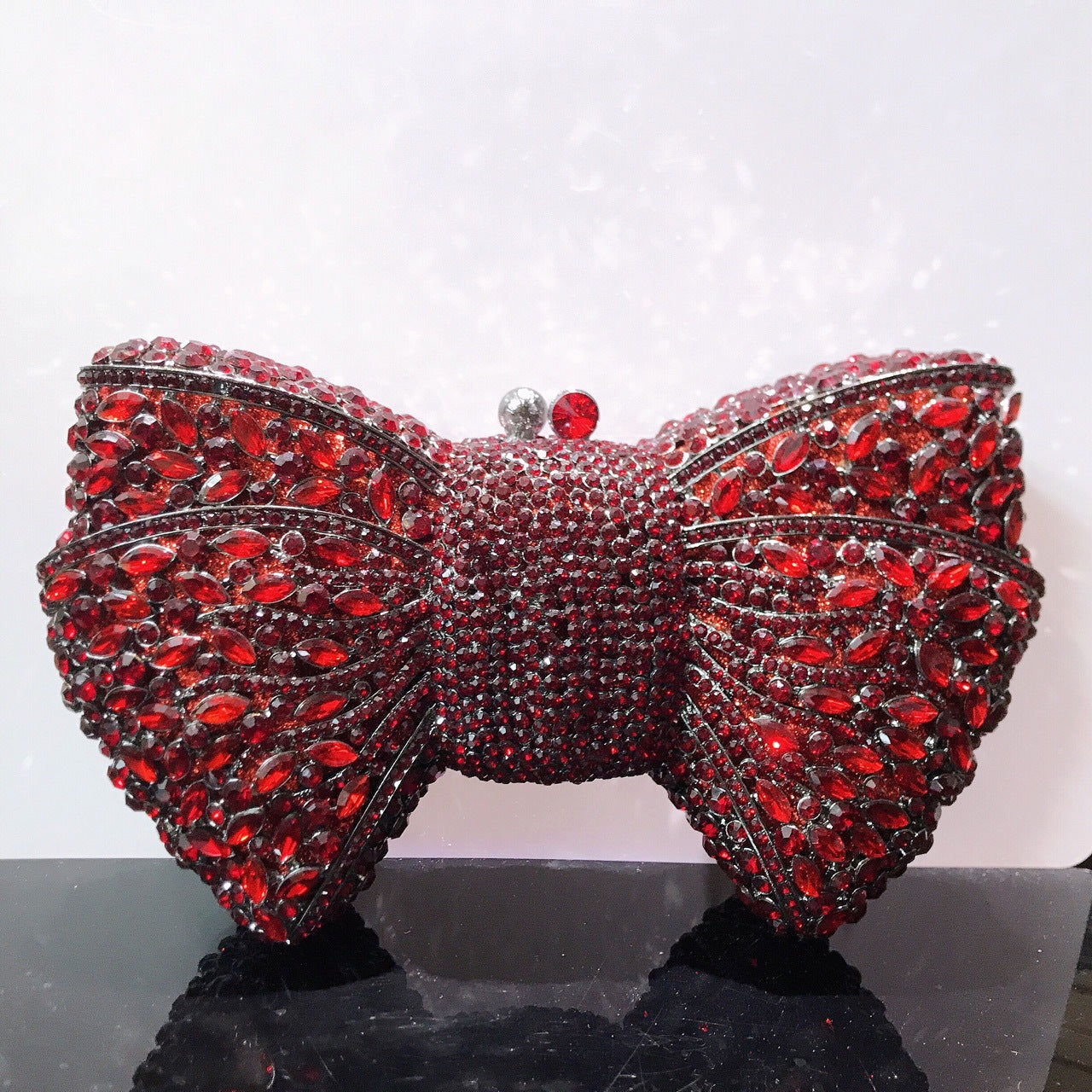 MRY · Diamond-encrusted bow dinner bag