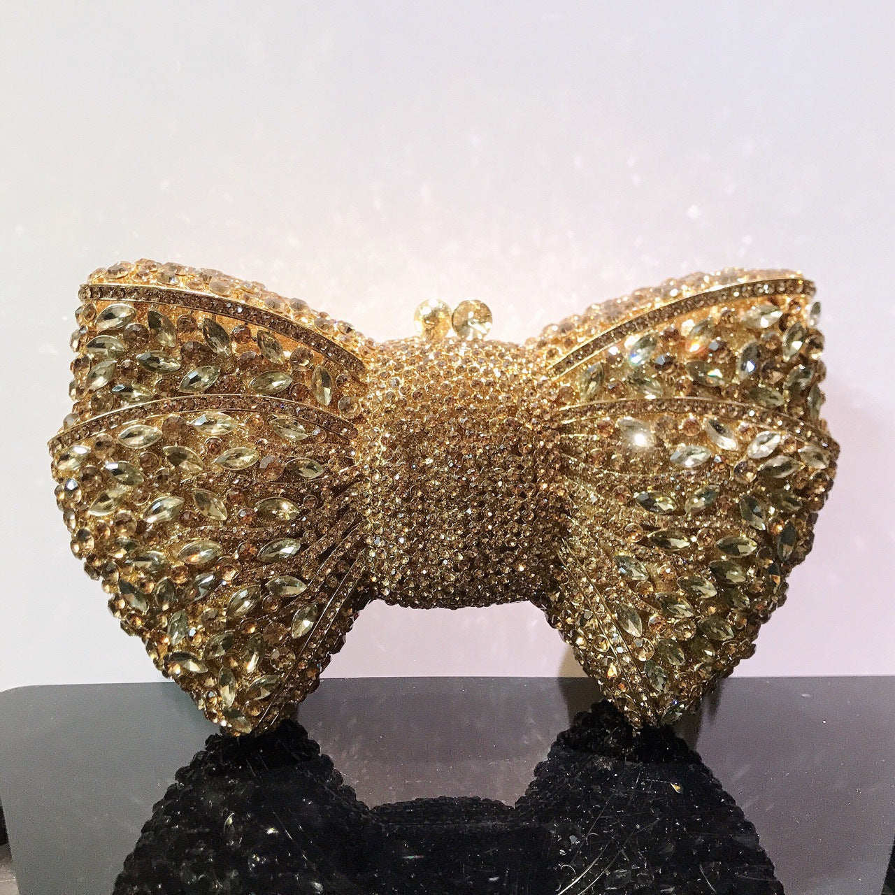 MRY · Diamond-encrusted bow dinner bag