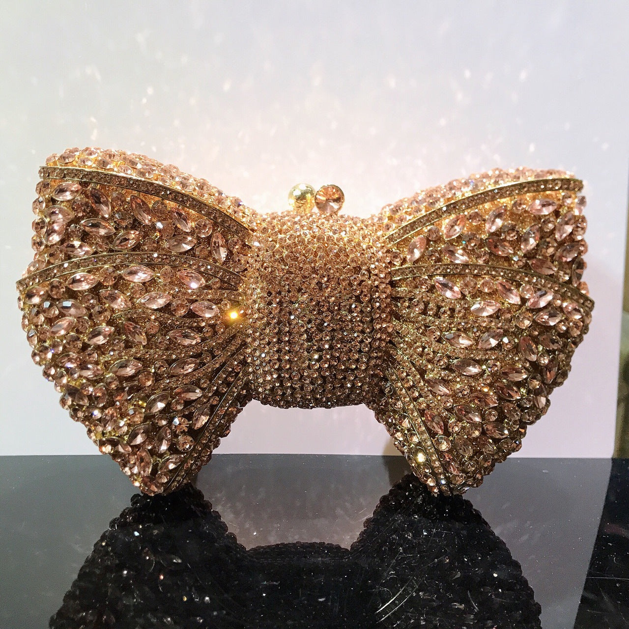 MRY · Diamond-encrusted bow dinner bag