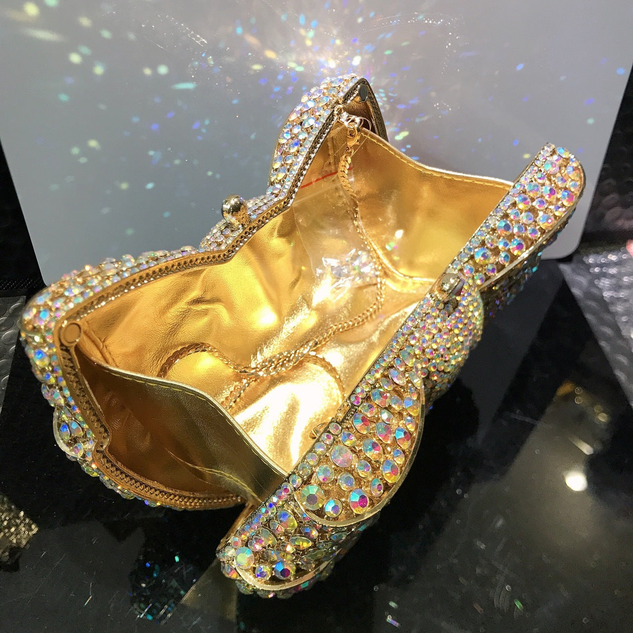 MRY · Diamond-encrusted bow dinner bag
