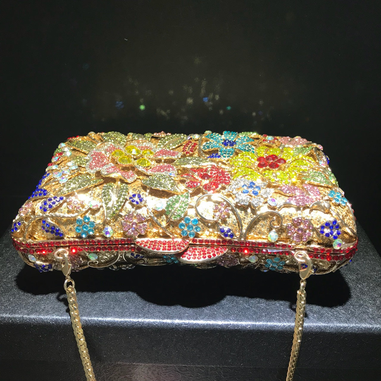 MRY · Floral and diamond-encrusted dinner bag